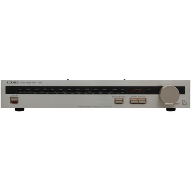 Luxman T-210L AM/FM Stereo Tuner gümüş renkli, vintage ses bileşeni.