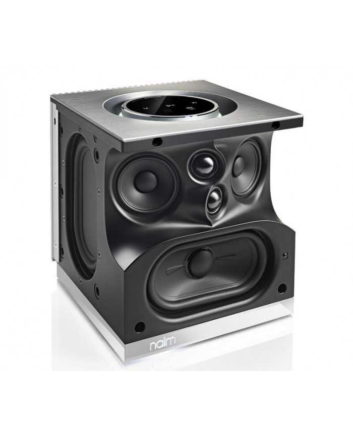 Naim Mu-So Qb kablosuz müzik sistemi, siyah ve gümüş renkli, kompakt ve modern tasarımlı hoparlör.